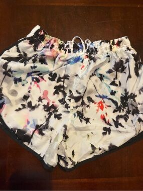 Nike Women's White Floral Athletic Shorts with Black Trim